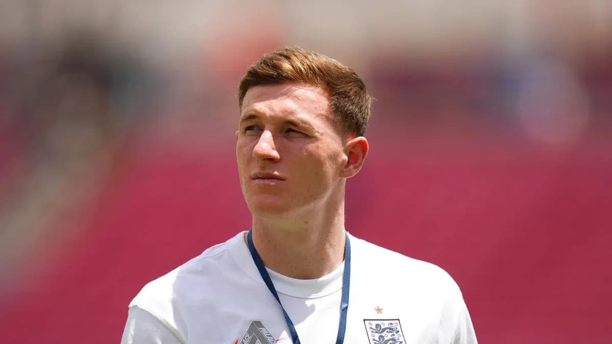 Player wearing England jersey on the pitch Player wearing England jersey on the pitch