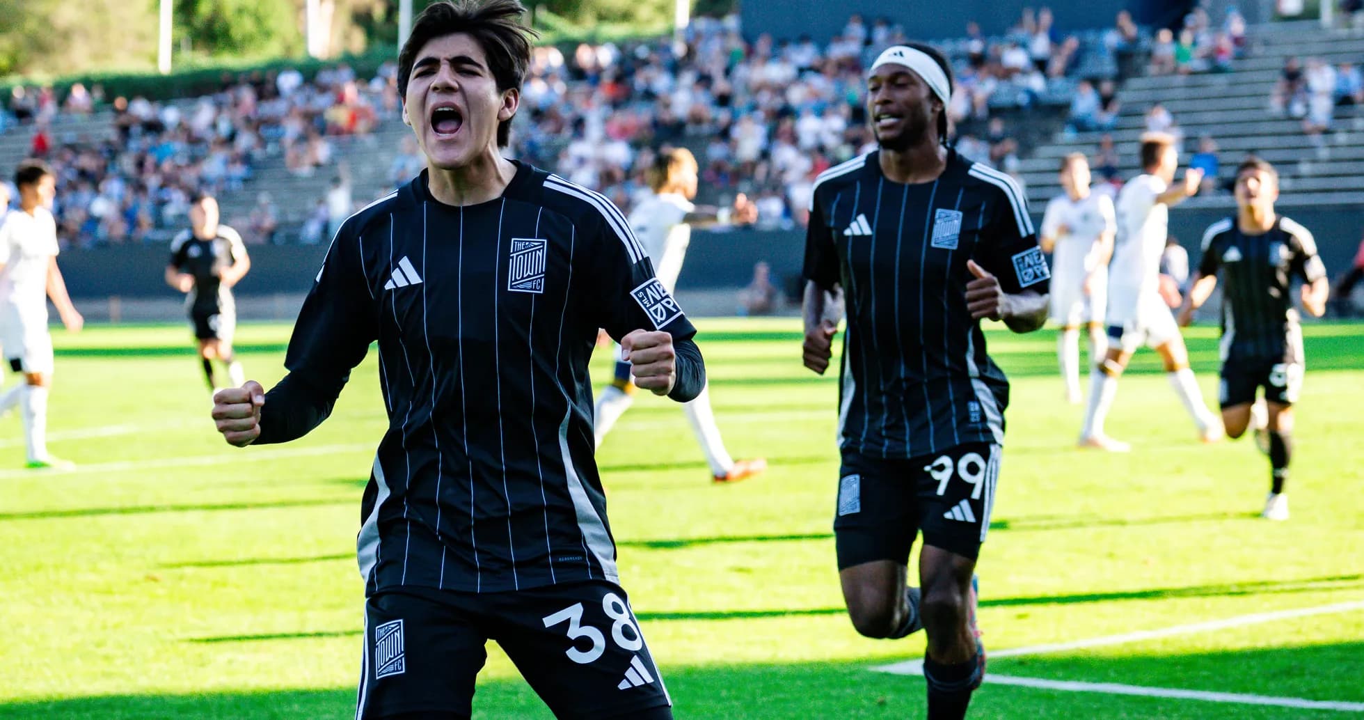 Players celebrating a goal during Town match Players celebrating a goal during Town match