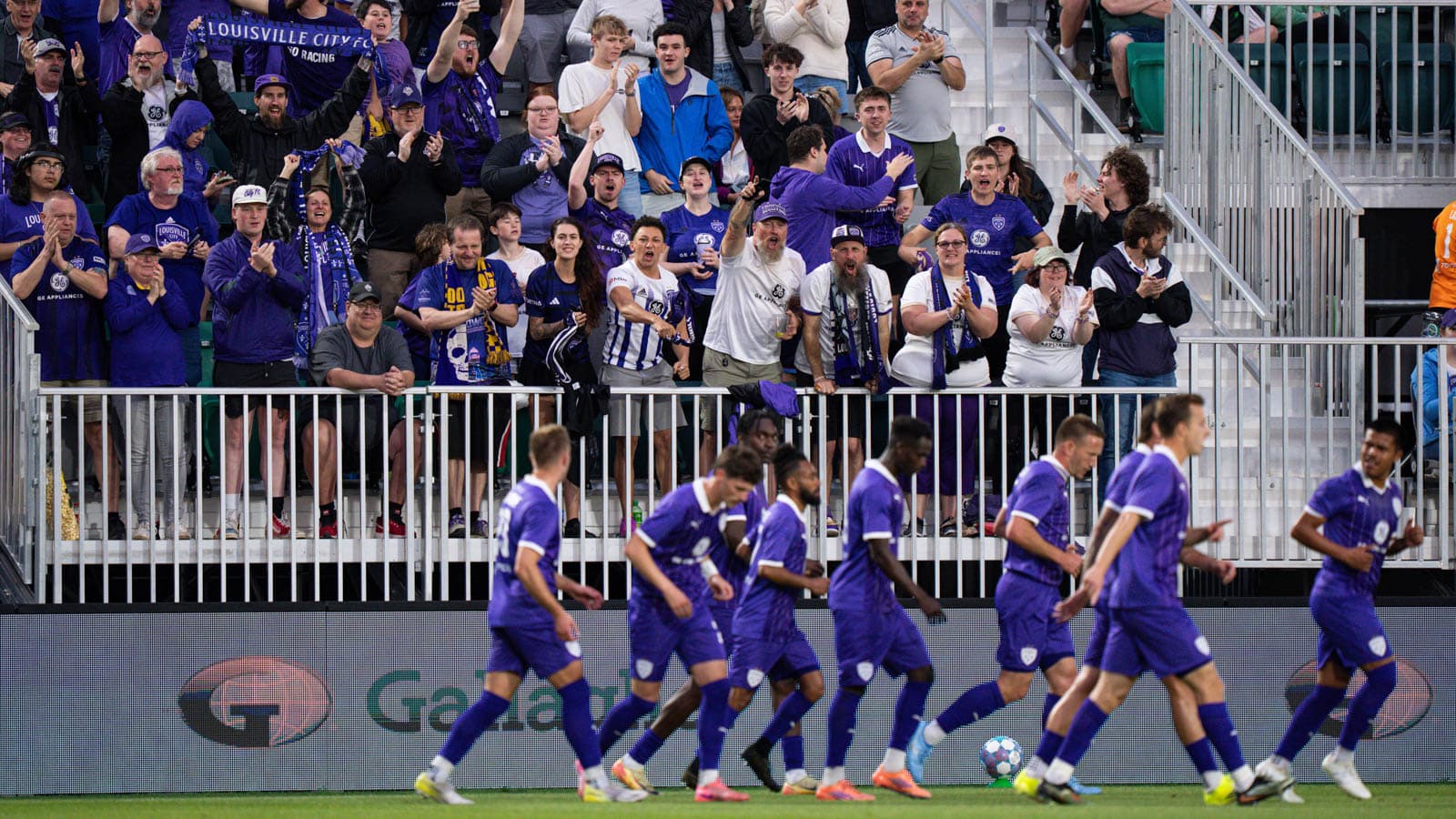 Louisville City fans celebrating during match Louisville City fans celebrating during match