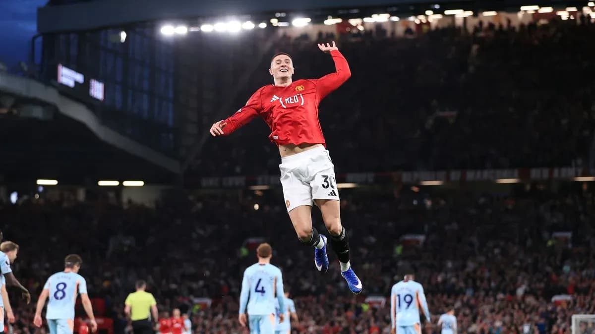 Player celebrating a goal during match at Old Trafford Player celebrating a goal during match at Old Trafford