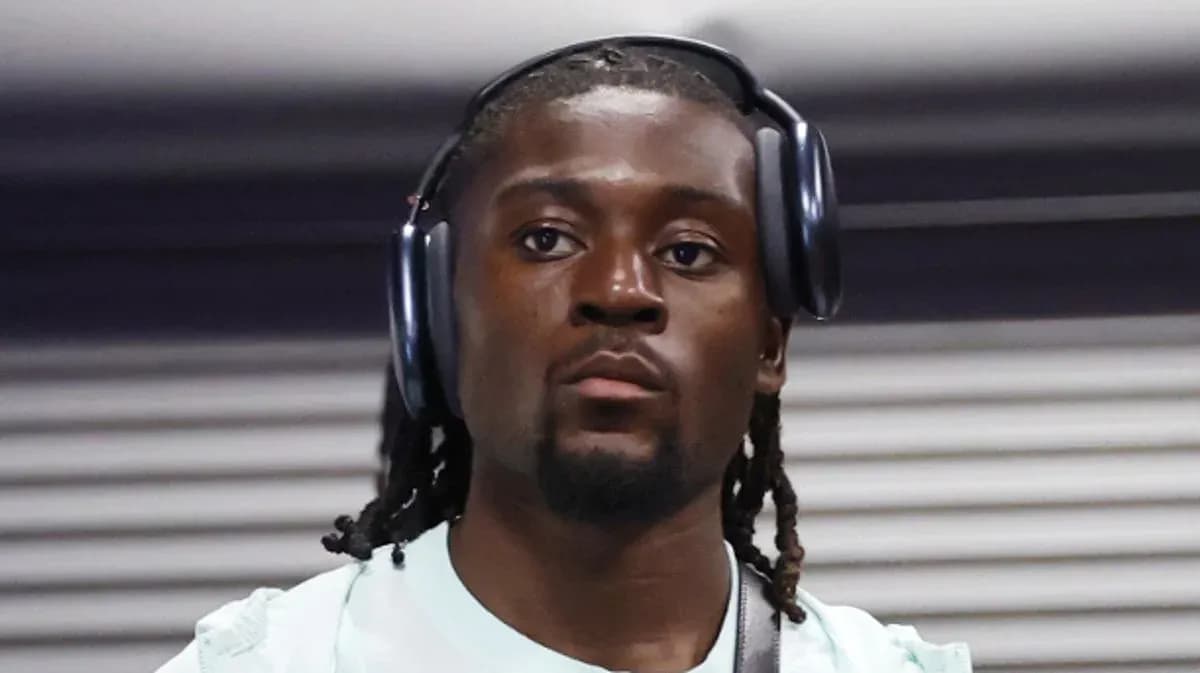 Player wearing headphones in a hallway Player wearing headphones in a hallway
