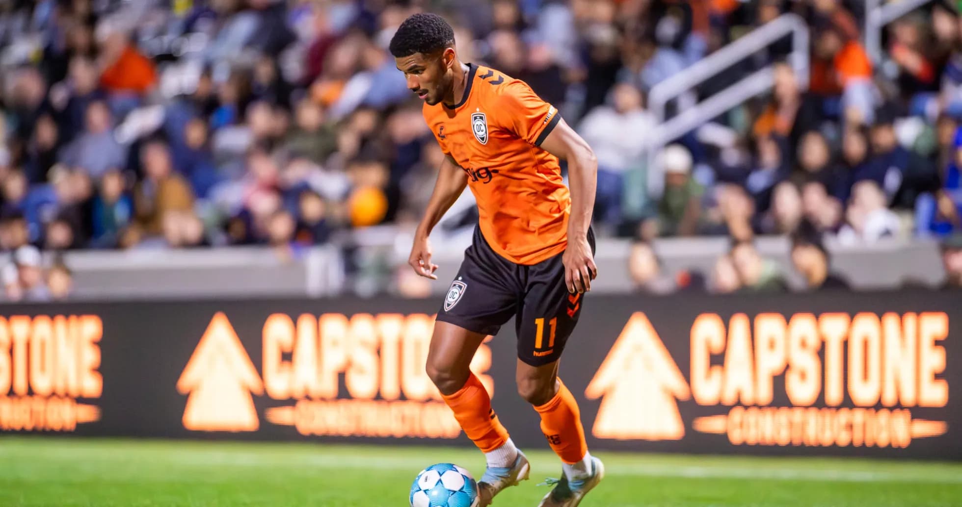 Player dribbling the ball during match Player dribbling the ball during match