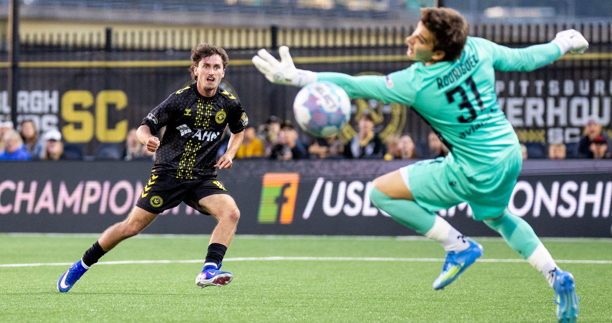 Pittsburgh Riverhounds player shooting on goal Pittsburgh Riverhounds player shooting on goal