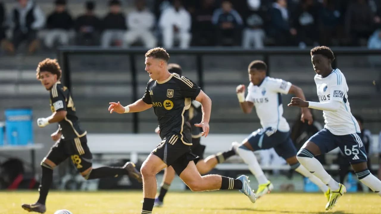 LAFC II player sprinting during match against Vancouver LAFC II player sprinting during match against Vancouver