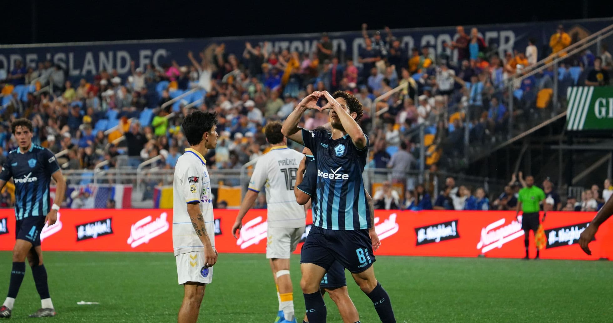 Player celebrating during Rhode Island vs Westchester SC match Player celebrating during Rhode Island vs Westchester SC match
