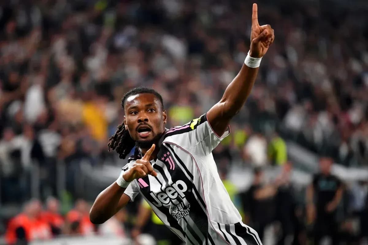 Player celebrating goal with raised finger at stadium Player celebrating goal with raised finger at stadium