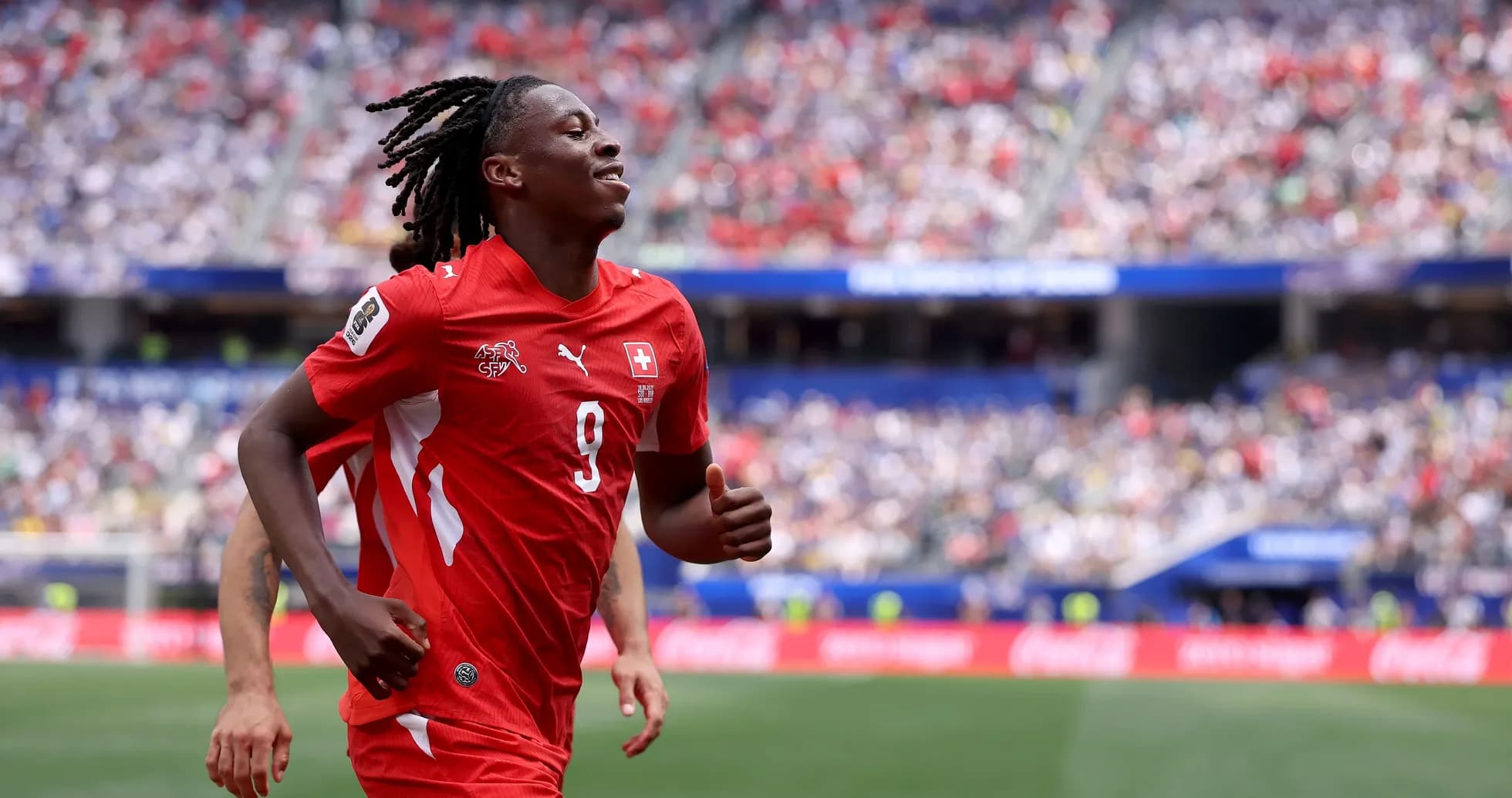 Player celebrating during a match on the field Player celebrating during a match on the field