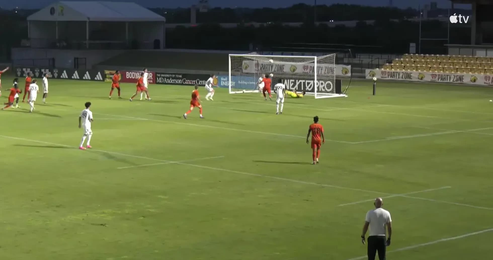 Players competing for the ball in MLS Next Pro match Players competing for the ball in MLS Next Pro match