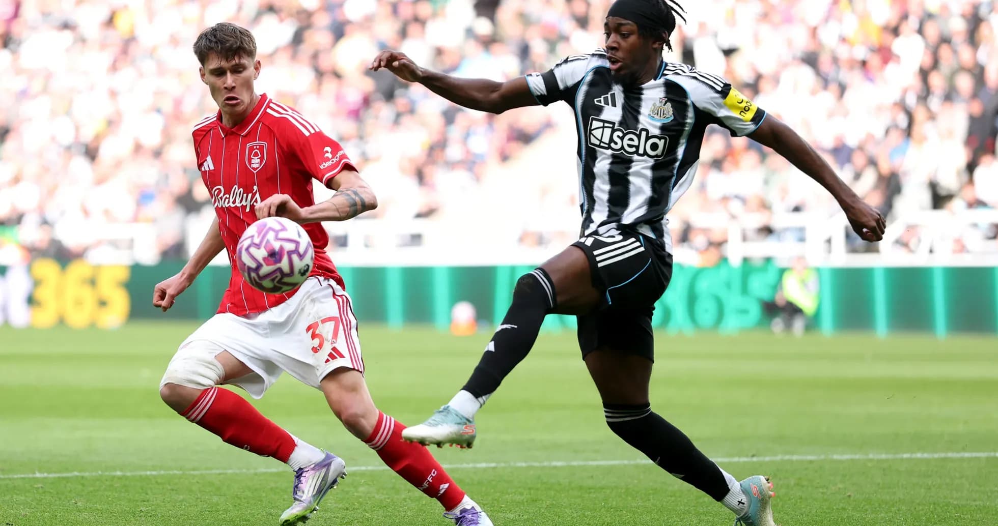 Player tackling during Nottingham Forest vs Newcastle match Player tackling during Nottingham Forest vs Newcastle match