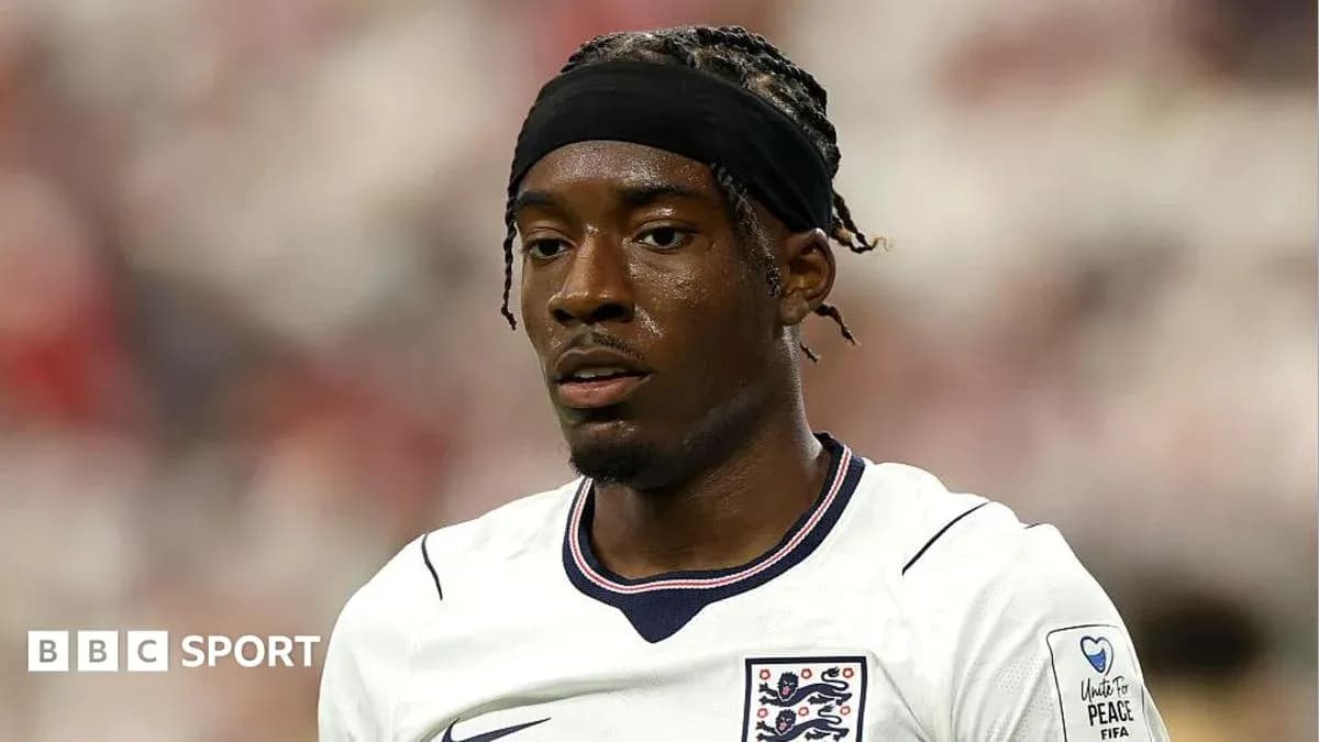 Player in England jersey during match action Player in England jersey during match action