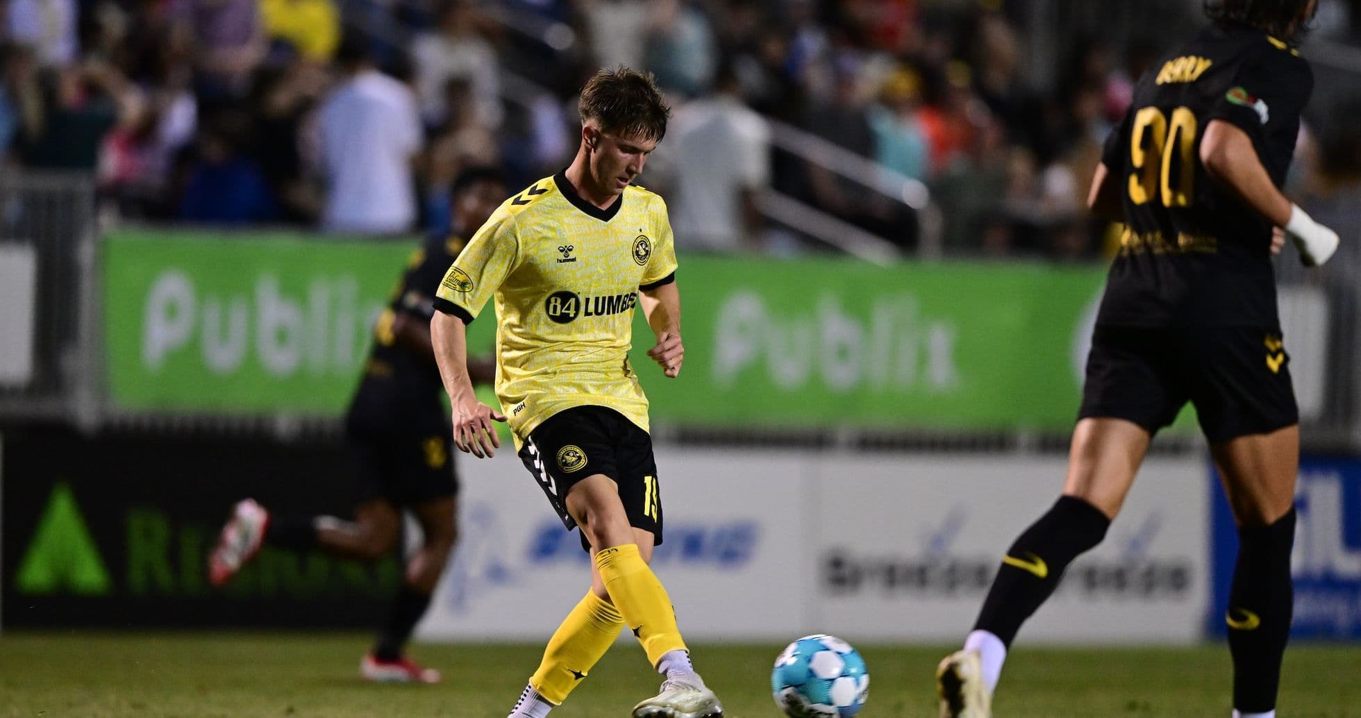 Charleston Battery player kicking the ball Charleston Battery player kicking the ball