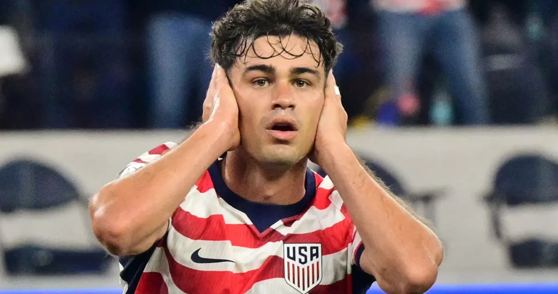 Player in USA jersey reacting during match Player in USA jersey reacting during match