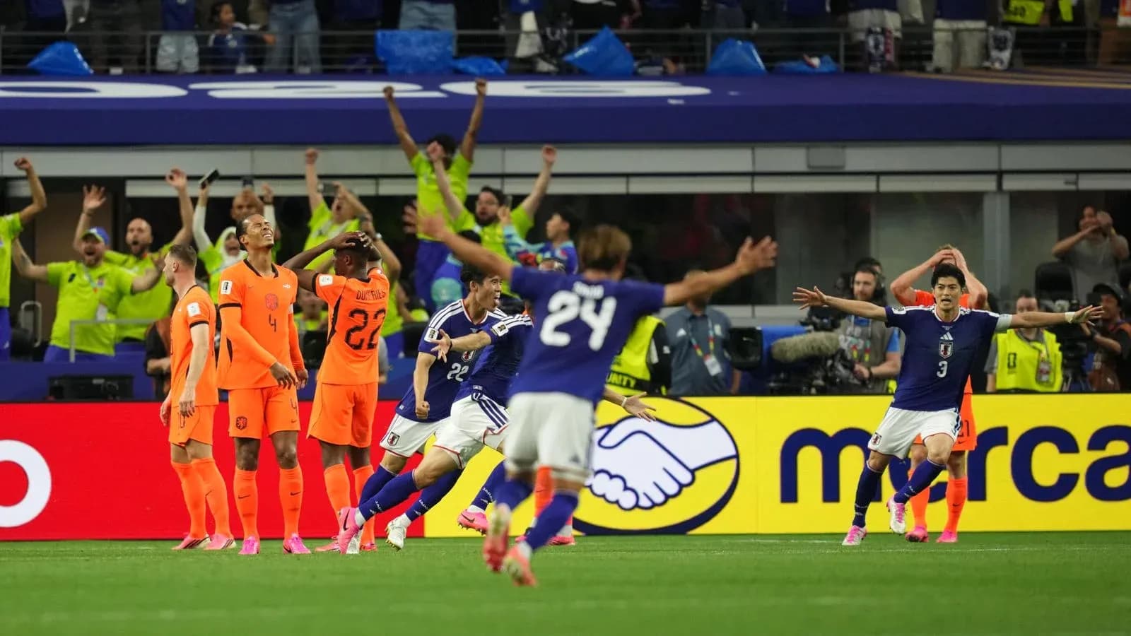 Japan players celebrating goal against Netherlands Japan players celebrating goal against Netherlands
