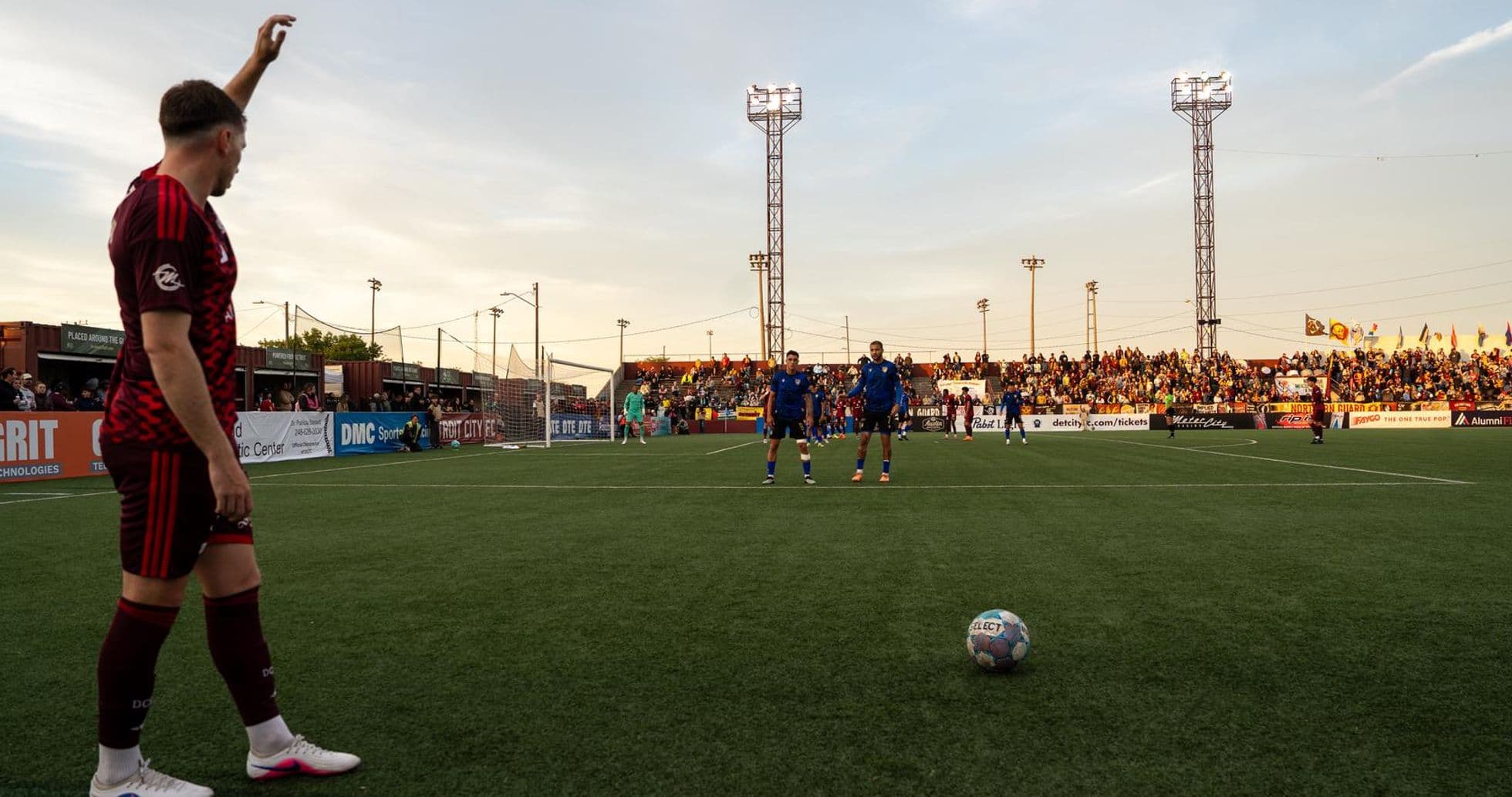 Players preparing for free kick during match Players preparing for free kick during match
