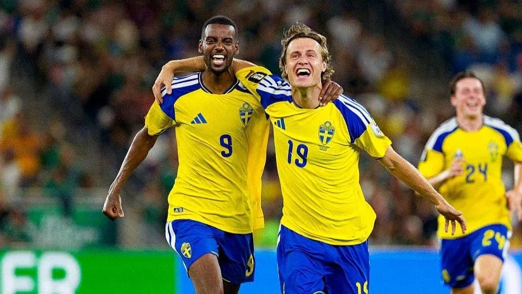 Two Swedish players celebrating a goal during match Two Swedish players celebrating a goal during match