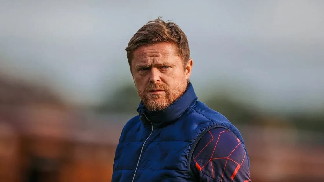 Coach observing during training session outdoors Coach observing during training session outdoors