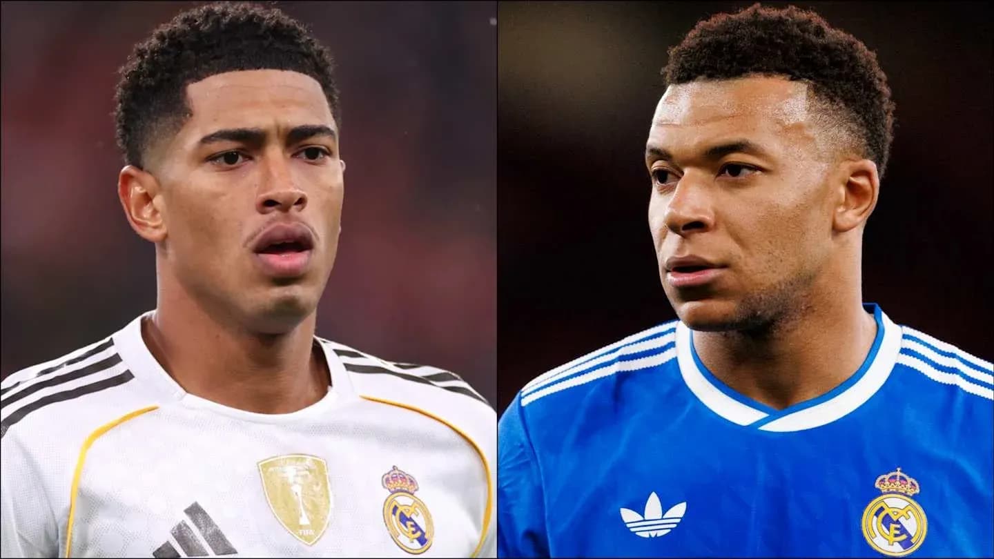 Two players in Real Madrid jerseys facing each other Two players in Real Madrid jerseys facing each other