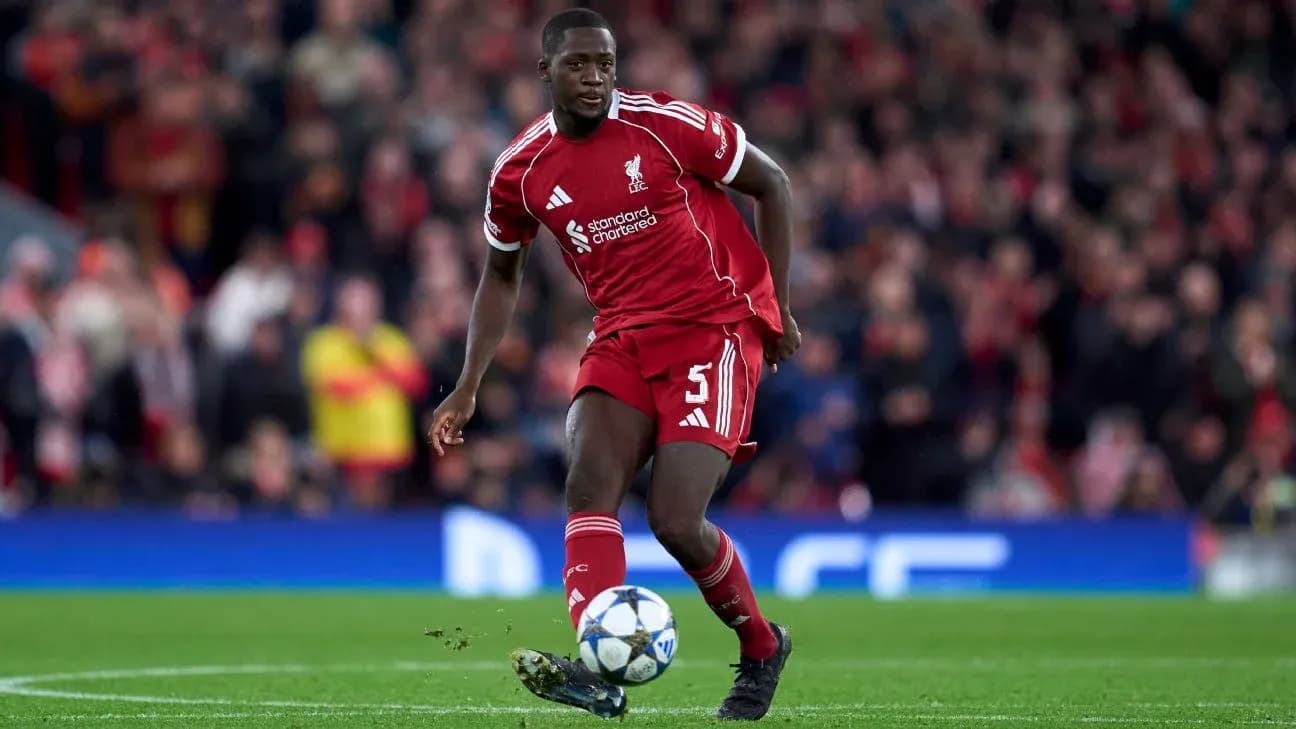 Liverpool player dribbling ball during match Liverpool player dribbling ball during match