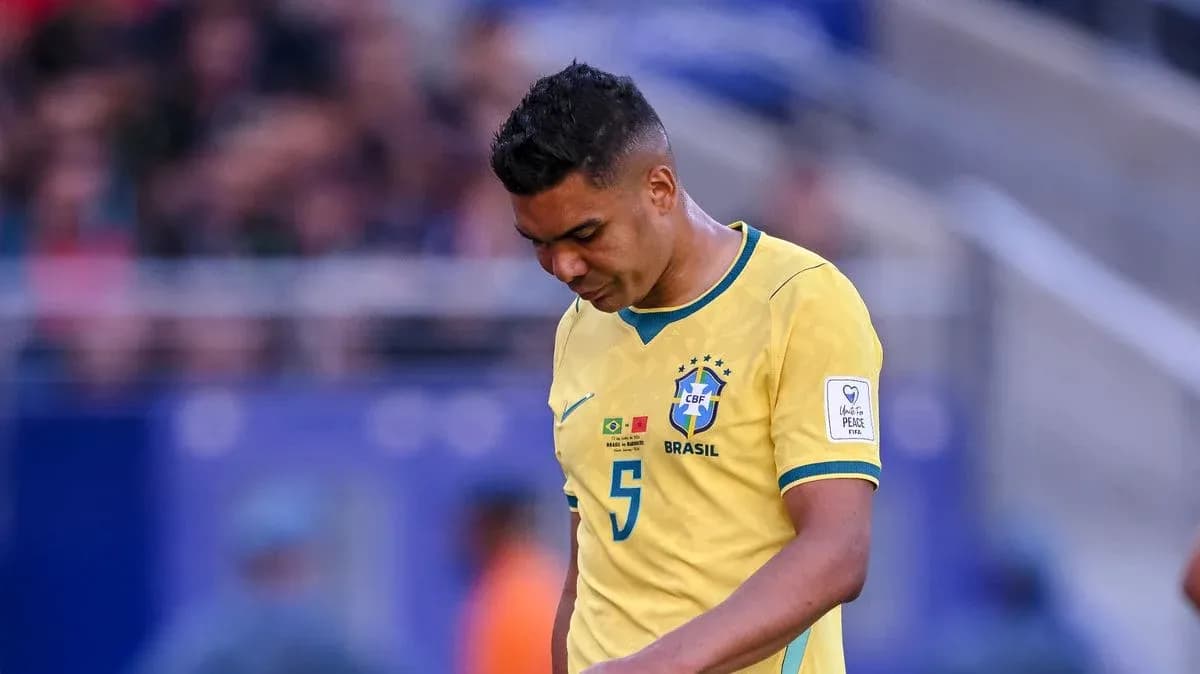 Brazilian player walking with head down during match Brazilian player walking with head down during match