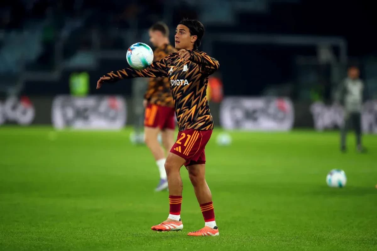 Player warming up with a ball during training session Player warming up with a ball during training session
