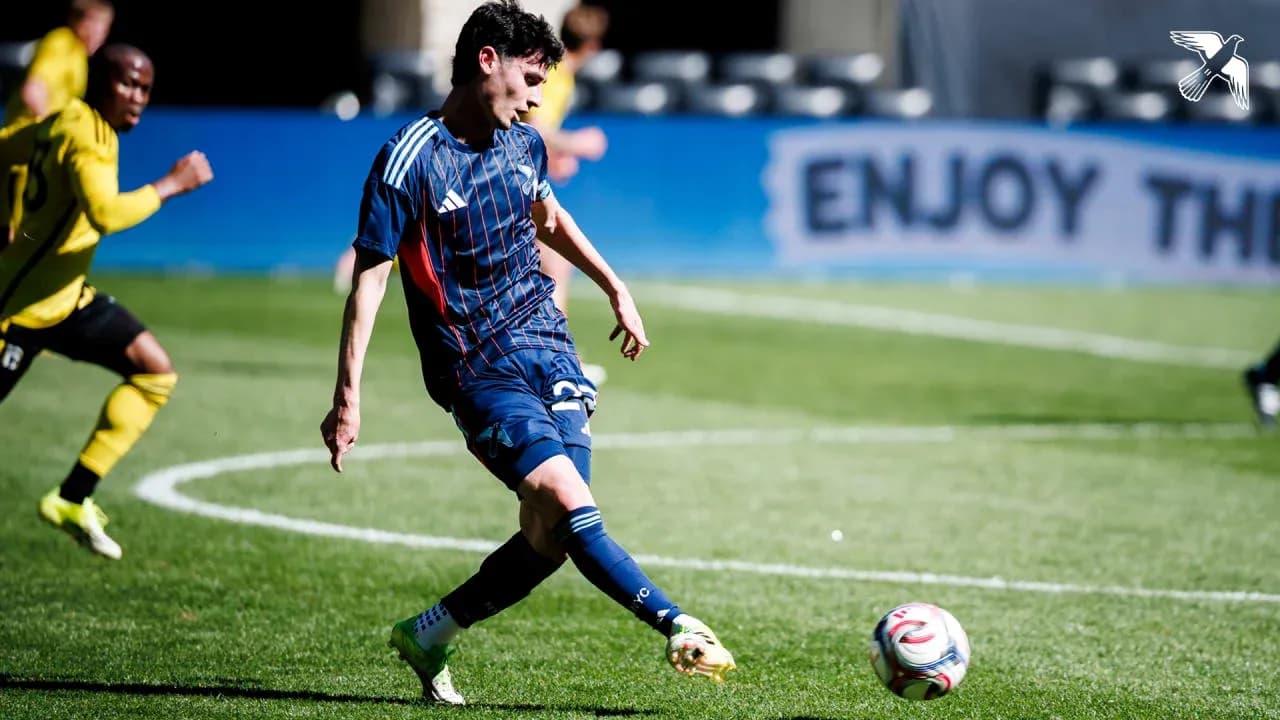 Player kicking ball during New England II match Player kicking ball during New England II match