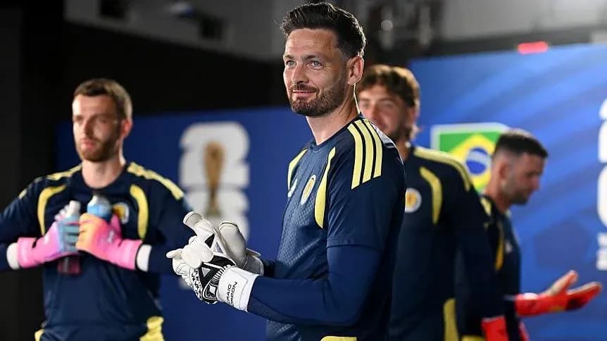 Goalkeeper and teammates preparing before match Goalkeeper and teammates preparing before match
