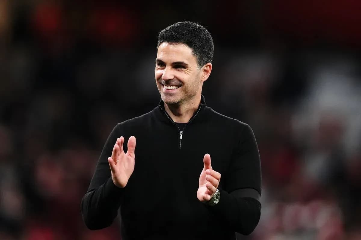 Manager clapping during a match at the stadium Manager clapping during a match at the stadium