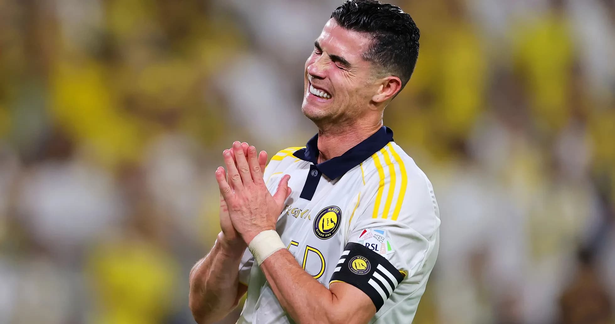 Player celebrating in team's jersey on the field Player celebrating in team's jersey on the field