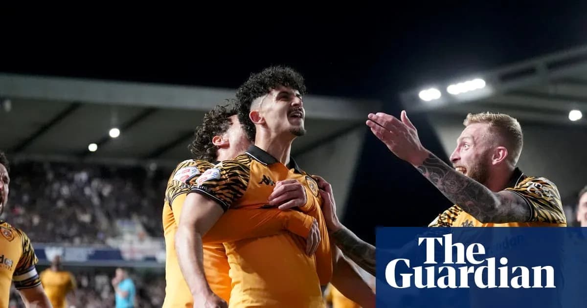 Players celebrating a goal during a football match Players celebrating a goal during a football match