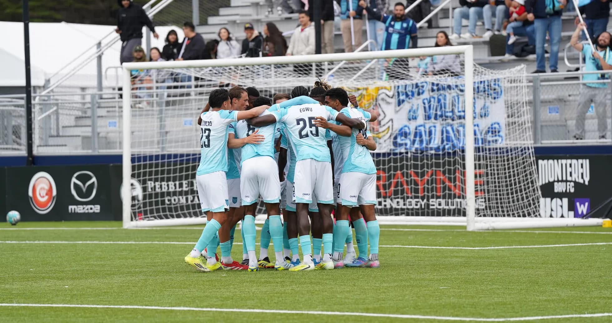 Monterey Bay players celebrating a goal Monterey Bay players celebrating a goal