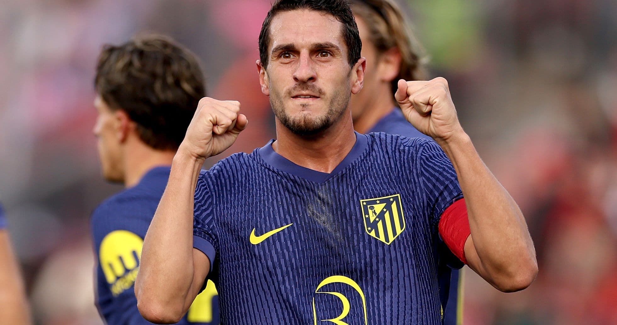 Atletico Madrid player celebrating after scoring Atletico Madrid player celebrating after scoring